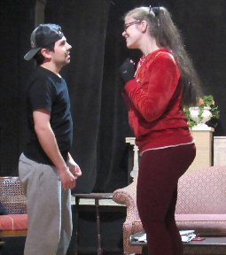 a young couple look at each other